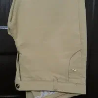 تعدادی شلوار مردانه و یک عدد کاپشن