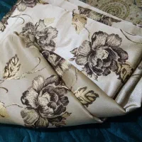 پارچه بسیار محکم وطلایی رنگ باگل برجسته