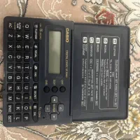 ماشین حساب و دفترچه کاسیو