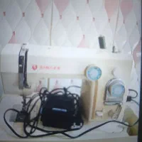 چرخ ژانومه|چرخ خیاطی و ریسندگی|قشم, |دیوار