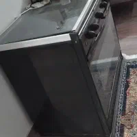 اجاق گاز پنج شعله صفحه لعاب سالم و بخاری گازی