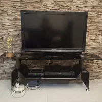 تلویزیون 37 اینچ پاناسونیک و میز تلویزیون شیشه ای