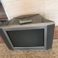 فرش و تلوزیون و میز