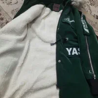 کاپشن|لباس|عطاملک, |دیوار