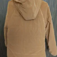 کاپشن سیلیکونی نونو آک|لباس|مهاجران, |دیوار