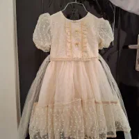 لباس توری دخترانه 7 تا 8 سال خارجی و کاملا نو