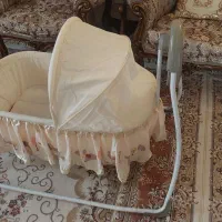 گهواره برقی موزیکال برند نی نی کو