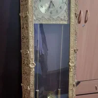 ساعت و آینه شمعدان