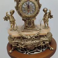 ساعت و شمعدان برنز