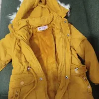 کاپشن دخترانه|لباس|قم, قلعه کامکار|دیوار