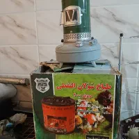 بخاری،چراغ نفتی،صندلی،استند،قفسه کتاب