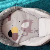 آغوشی و کلاه فرم دهی سر نوزاد