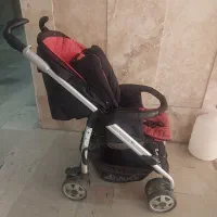 کالسکه بچه آلمانی قرمز مشکی اسپورت مدل عصایی