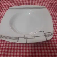 بشقاب خورشت خوری دودست