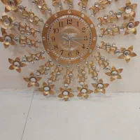 ساعت دیواری طلایی شیک یک تومن