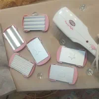 اتوی مووماساژور صورت  باطری خور