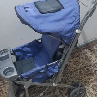 یک‌میزوصندلی‌وجاروبرقی‌وکالسکه‌سالم