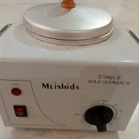 دستگاه وکس درحد