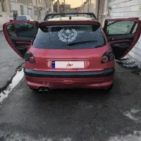 ماشین پژو ۲۰۶ آلبالویی اسپرت