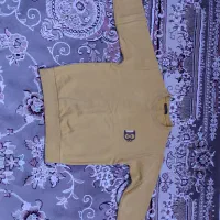 تعدادی لباس‌ پسرانه|لباس|میانه, |دیوار