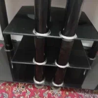 یکعددمیزتلویزیون شیشه ای محکم