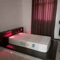 تخت دو نفره چراغ ریموت دار همراه با کمد دو درب
