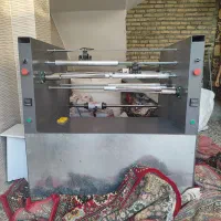 دستگاه سه کاره رول کن کیسه زباله و سفره یکبارمصرف