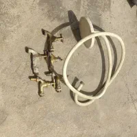 دوش حمام و شیر برنجی