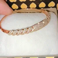 دستبند ژوپینگ فول نگین  آب طلا خورده نونونو