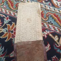 یه سری کتابهای قدیمی خط سنگی|کلکسیون اشیاء عتیقه|فردوس (خراسان), |دیوار