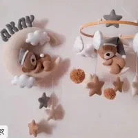 سفارشات ست سیسمونی نوزادان و آویز گهواره و اسمی