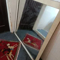 اینه بزرگ با قاب دور