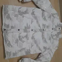 کاپشن مردانه شمعی ضد آب شبرنگی ۴۴تا ۴۸ آکبند