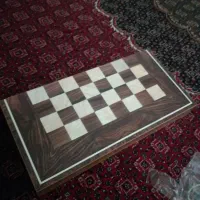 تخته نرد و کلاه