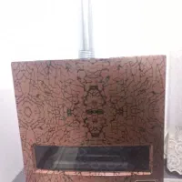 بخاری۱۲ هزار آدریان.درحد نو|بخاری، هیتر، شومینه|آستانه اشرفیه, |دیوار