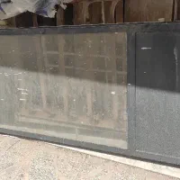 درب آهنی همراه شیشه سالم بدون چهار چوب