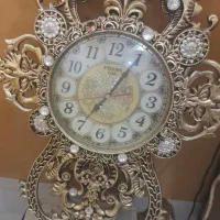ساعت دیواری طلایی بزرگ