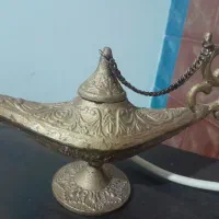 یک عدد چراغ روغنی