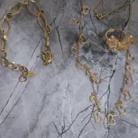 طلا در حد نو|جواهرات|اشتهارد, |دیوار