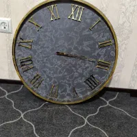 ساعت صفحه چرم دور استیل طلایی