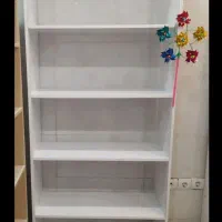 قفسه چوبی و میز کامپیوتر