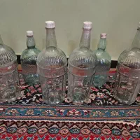 بطری شیشه ای شیشه. ظرف شیشه ای.دبه.