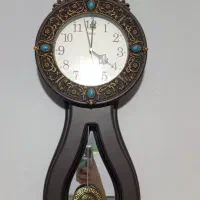 ساعت دیواری تاج دار آونگ دار