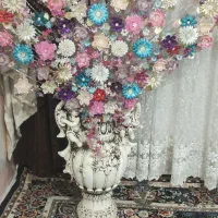 گل ب همراه گلدان