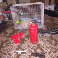 مقداری لوازم خودرو و قفس