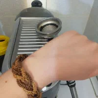 دستبند بافته شده با نخ موم زده