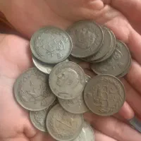 تعدادی پول و سکه کلکسیونی شیر خورشید