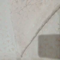 پارچه مبلی و پرده شانل مخمل گل برجسته
