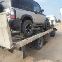 حمل و جابجایی خودرو لیفتراک بابکت با کفی خودروبر