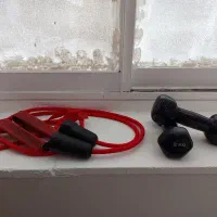 دمبل و کش ورزشی